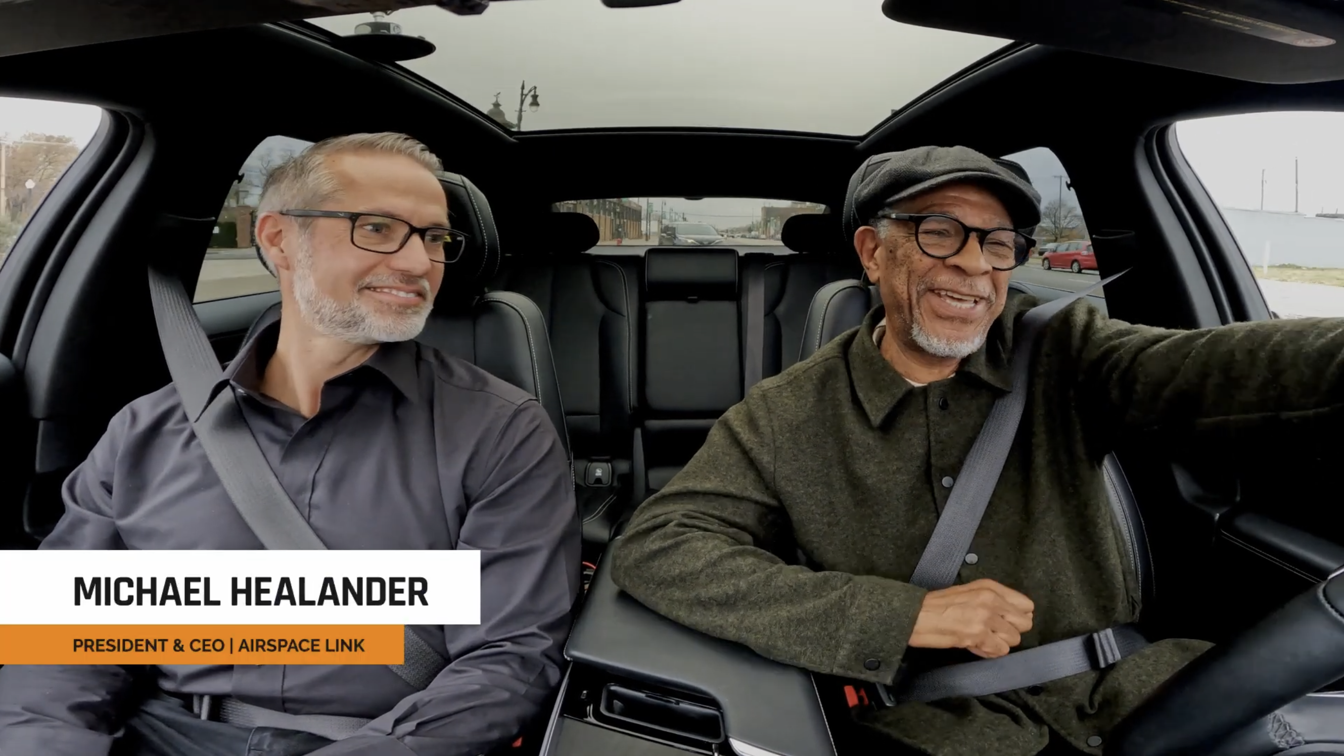 CEOs in Cars: Michael Healander, President & CEO of Airspace Link, riding in the passenger seat beside the Detroit Region rideshare driver.